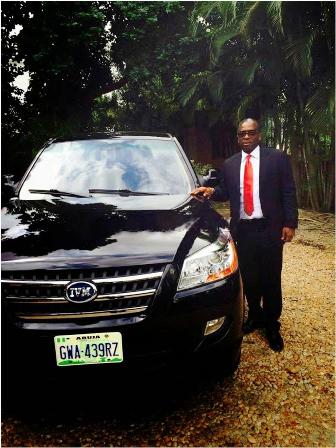 Segun Awolowo posing with Innoson’s SUV 
