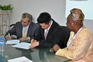 Kia and Dana Motors officials signing agreement which led to setting up of KIA Assembly plant in Lagos Nigeria
