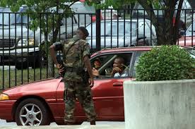 US Army Military Police (MP) conducts a 100 percent identification check on