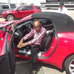 Femi Owoeye alighting from the F-Type after mini test-drive