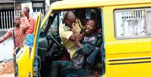 An overbearing LASTMA official assaulting a commercial transporter during Gov. Fashola's regime