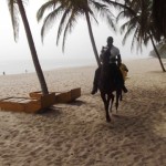 Jimoh Olawale, Marketing Mgr., Dana Motors Ltd., on horse ride at the beach Resort on Saturday